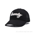 Bestickte schwarze Trucker -Kappe